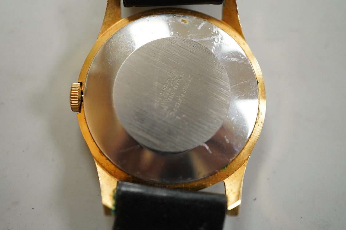 A George V silver cased goliath calendar moon phase open faced pocket watch, case diameter approx. 67mm(a.f.), together with five other pocket watches, including silver and white metal Waltham, a Camerer Cuss chrome case